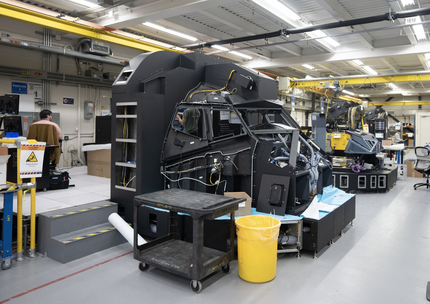 The flight simulator assembly plant is seen at the CAE facility in Montreal, Tuesday, Jan. 14, 2025. THE CANADIAN PRESS/Ryan Remiorz