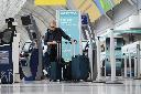 Passengers are seen in the WestJet check-in area at Pearson International Airport, in Toronto, Saturday, June 29, 2024. THE CANADIAN PRESS/Christopher Katsarov”