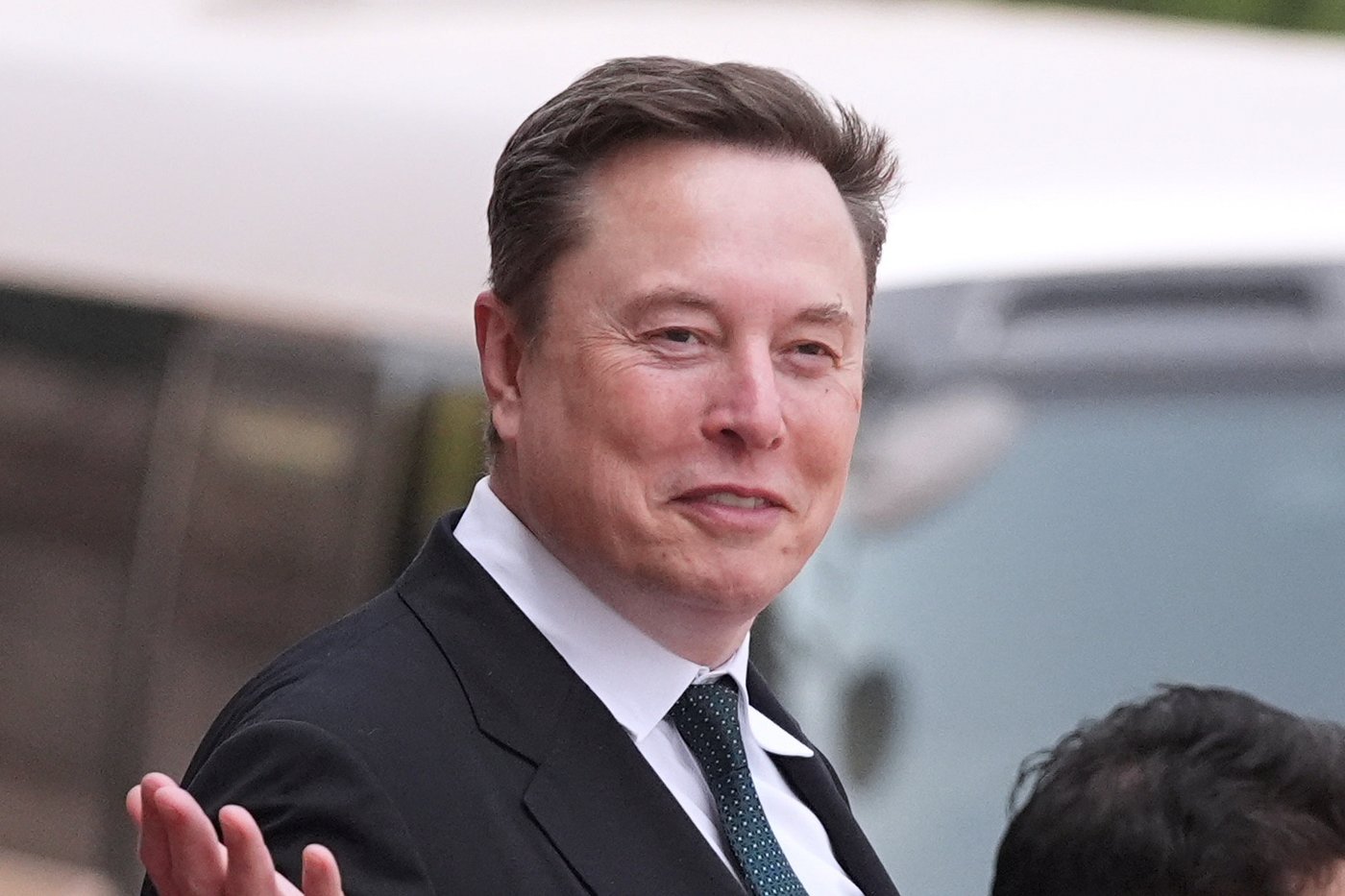 FILE - Elon Musk departs after a welcome ceremony with President Donald Trump and China's President Xi Jinping at the Great Hall of the People, Thursday, May 14, 2026, in Beijing. (AP Photo/Mark Schiefelbein, File)