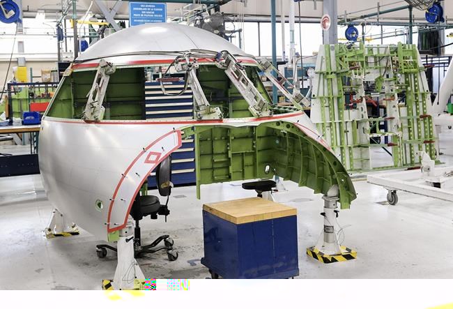A Bombardier Challenger 650 aircraft cockpit is shown under construction at Bombardier's Challenger manufacturing plant in Montreal, Wednesday, April 5, 2023.&nbsp;Canadian aerospace companies are pushing back against the notion that a Bombardier Inc. contract win to replace aging military patrol planes would be the most beneficial, stating that a deal between Ottawa and U.S. airplane giant Boeing Inc. could be at least as lucrative.&nbsp;THE CANADIAN PRESS/Graham Hughes