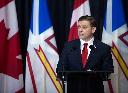 Newfoundland and Labrador Premier Andrew Furey holds a news conference in St.John's, Tuesday, Feb. 25, 2025 where he announced his resignation as premier. THE CANADIAN PRESS/Paul Daly