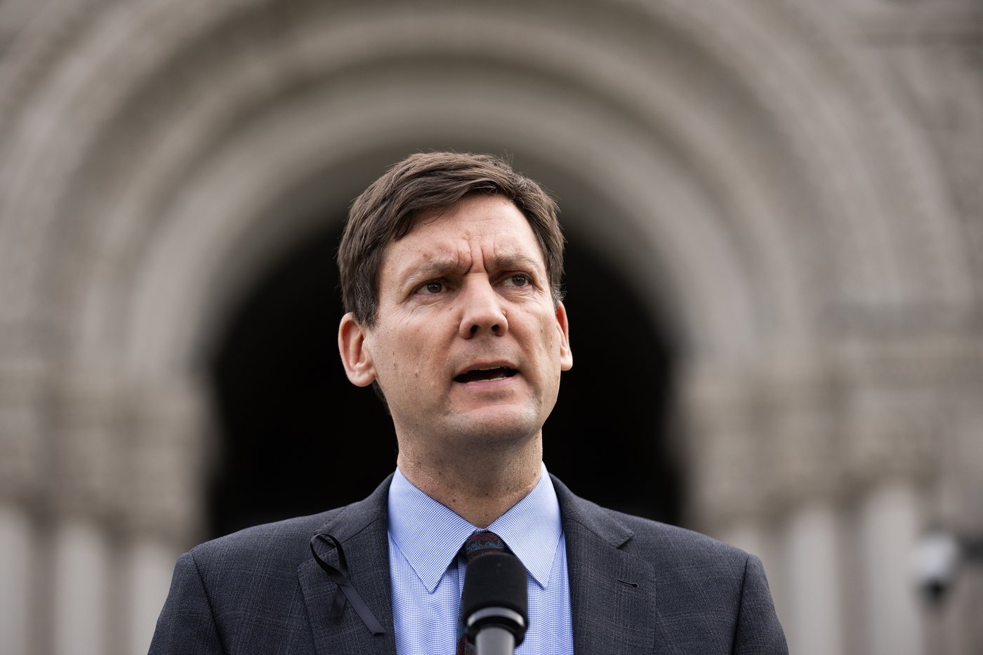 Premier David Eby speaks during a press conference at the legislature in Victoria, B.C., on Thursday, Feb. 12, 2026. THE CANADIAN PRESS/Chad Hipolito