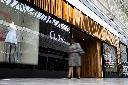 People walk past an Aritzia store in Pointe-Claire, Que., on Friday, July 11, 2025. THE CANADIAN PRESS/Christopher Katsarov