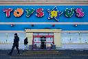 Shoppers exit a Toys 'R' Us store in Vaughan, Ont., on Wednesday, Feb. 4, 2026. THE CANADIAN PRESS/Sammy Kogan