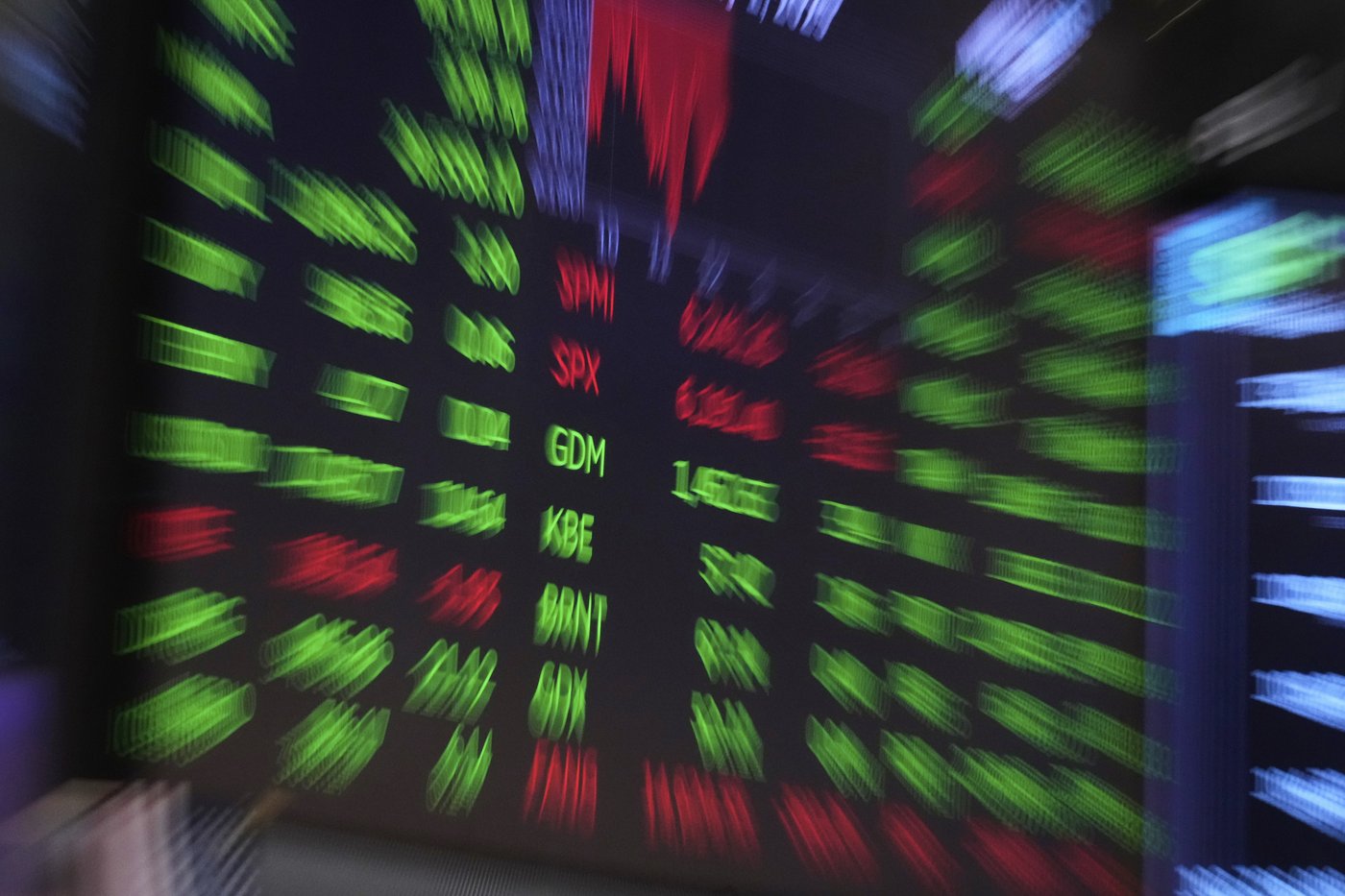 A board above the trading floor of the New York Stock Exchange is shown in this image, Tuesday, July 1, 2025. (AP Photo/Richard Drew)