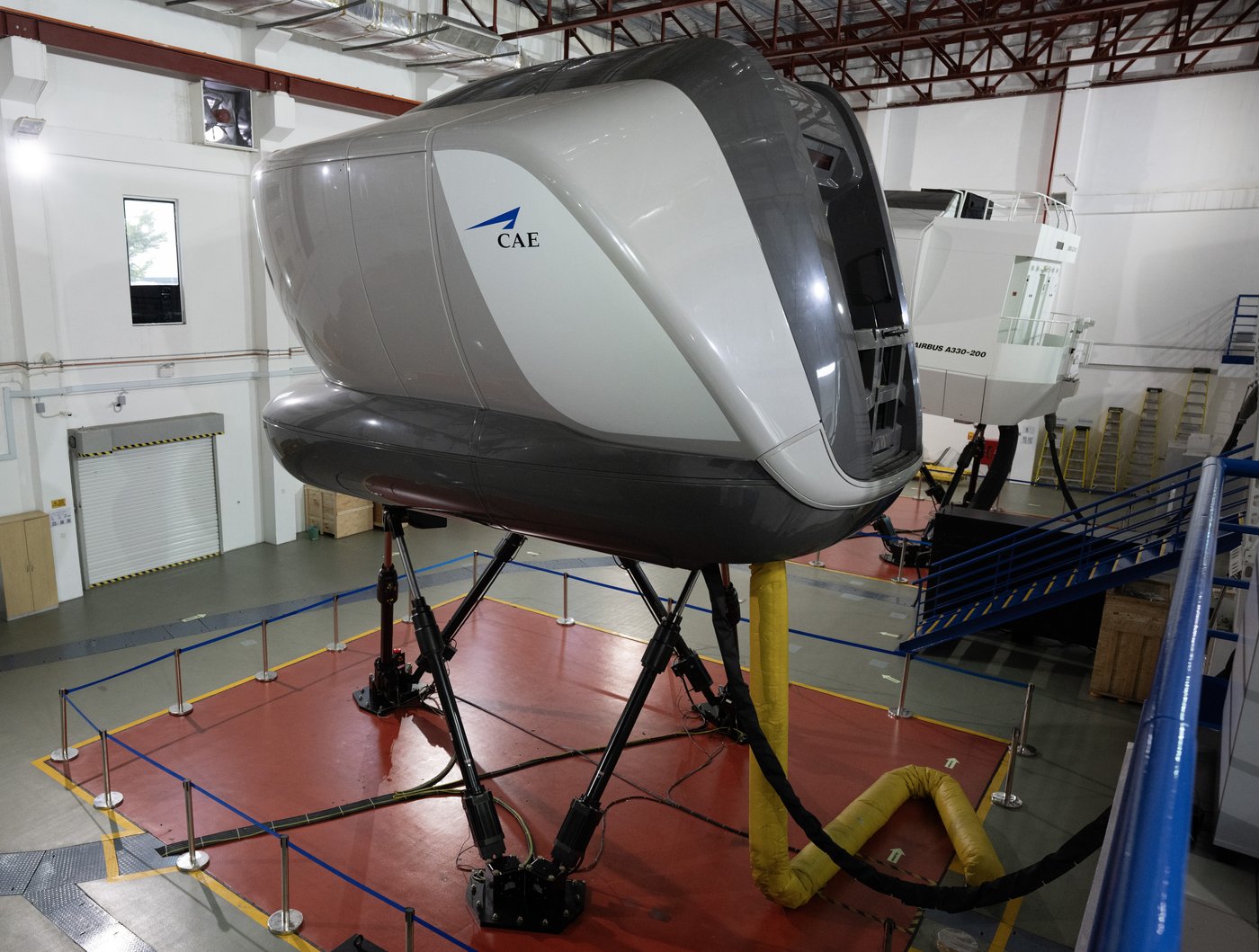 Training simulators are seen at a CAE training facility in Kuala Lumpur, Malaysia, Monday, Oct. 27, 2025. THE CANADIAN PRESS/Adrian Wyld
