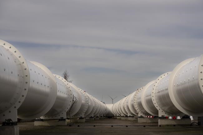 The split in a hyperloop tube allows vehicles to change directions at a test facility of new European test center for hyperloop transportation technology which opens in Veendam, northern Netherlands, Tuesday, March 26, 2024. (AP Photo/Peter Dejong)
