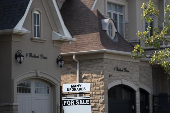 Canada Mortgage and Housing Corp. says the annual pace of housing starts in September was up five per cent compared with August. A real estate sign is shown in Vaughan, Ont. on Thursday Sept. 12, 2024. THE CANADIAN PRESS/Paige Taylor White