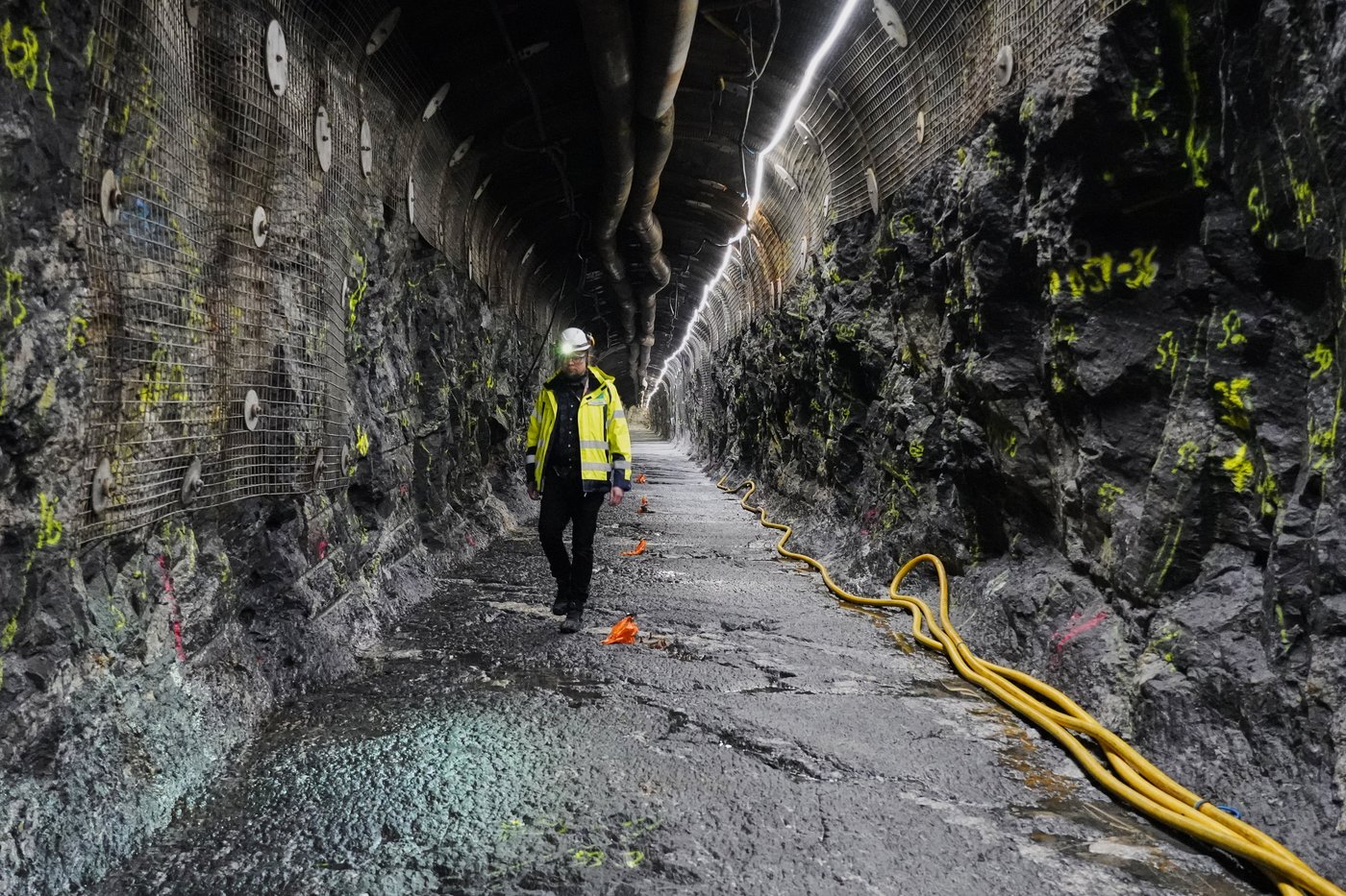 Geologist Tuomas Pere walks down a disposal tunnel inside the Posiva Onkalo nuclear waste repository on the island of Olkiluoto, Finland, Tuesday, Feb. 24, 2026. (AP Photo/James Brooks)