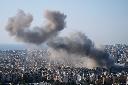 Smoke rise from an Israeli airstrike in Dahiyeh, Beirut's southern suburbs, Lebanon, Tuesday, March 10, 2026. (AP Photo/Bilal Hussein)