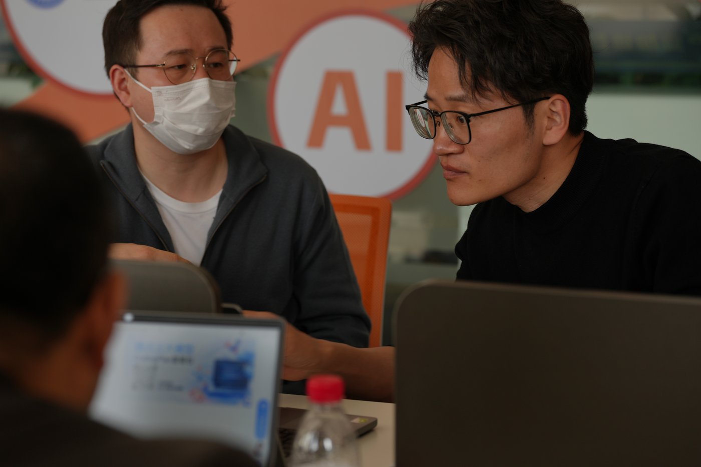 People install RedClaw AI software on their laptops in Beijing on March 22, 2026. (AP Photo/Andy Wong)