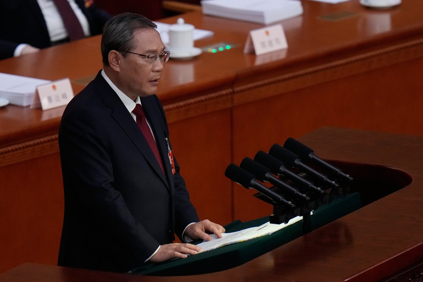 Chinese Premier Li Qiang speaks during opening session of the National People's Congress (NPC) in Beijing, Thursday, March 5, 2026. (AP Photo/Andy Wong)