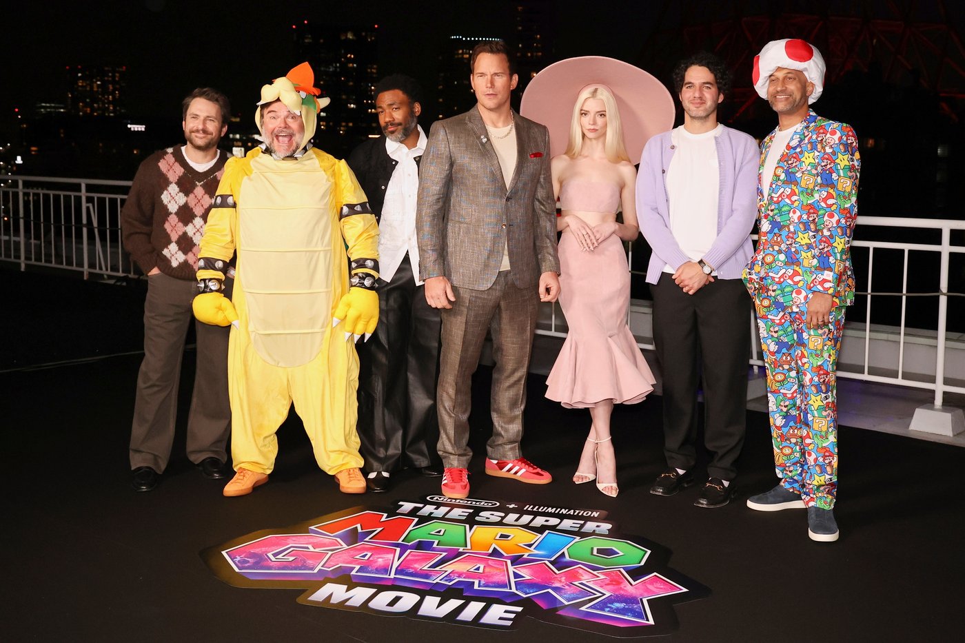 Charlie Day, from left, Jack Black, Donald Glover, Chris Pratt, Anya Taylor-Joy, Benny Safdie and Keegan Michael Key pose for photographers at the photo call for the film "The Super Mario Galaxy Movie" in Tokyo, Thursday, March 26, 2026. (AP Photo/Rodrigo Reyes)