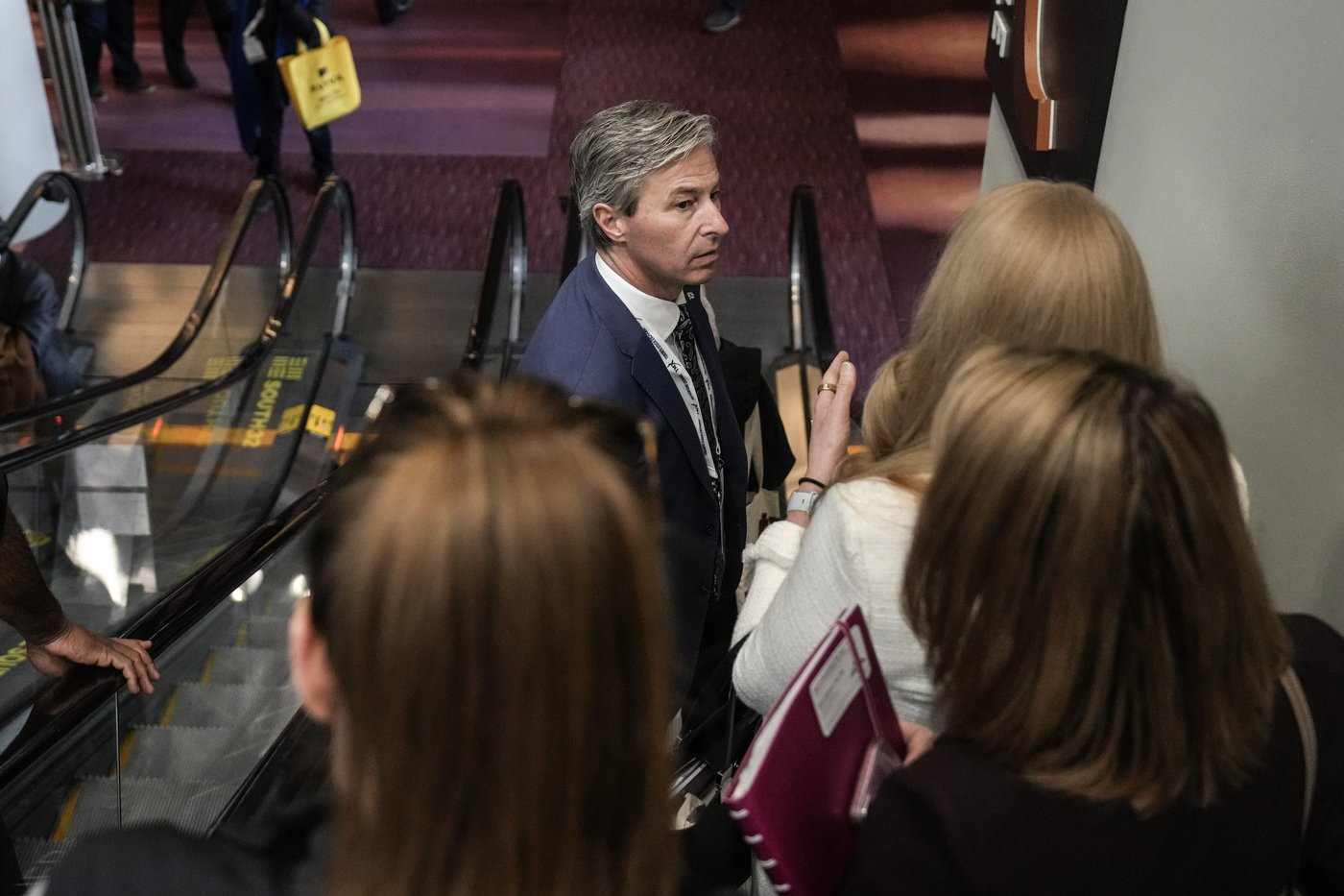 Nova Scotia Premier Tim Houston speaks to a colleague as he attends the Prospectors and Developers Association of Canada (PDAC) convention in Toronto on Monday March 2, 2026. THE CANADIAN PRESS/Chris Young
