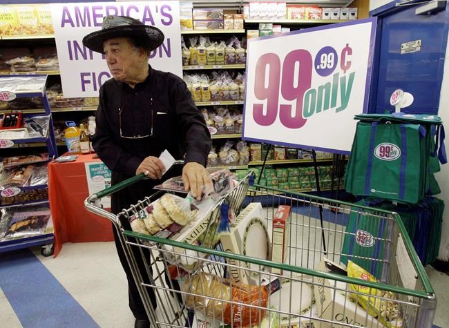 FILE - Jacques Elsair shops at a 99 Cents Only Store, on Sept. 8, 200, in Los Angeles. California-based 99 Cents Only Stores announced it will close all 371 of its outlets effective Friday, April 5, 2024, the company said, ending a 42 year retail run of selling nothing but items priced just under a dollar. (AP Photo/Nick Ut, File)