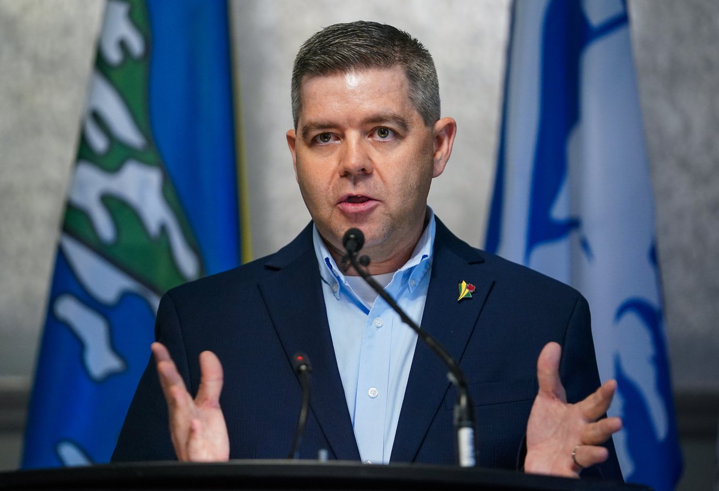 Jeremy Harrison, the minister responsible for SaskPower, gestures while speaking during a press conference about a wind energy project in Saskatchewan in Regina on Monday, June 24, 2024. THE CANADIAN PRESS/Heywood Yu