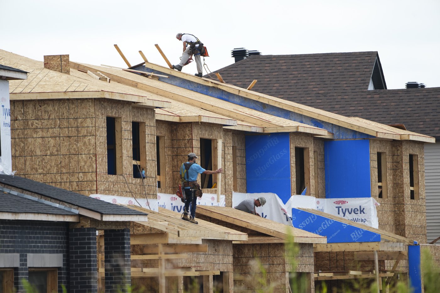 The Canadian Home Builders' Association wants the federal government to extend the amortization period for insured mortgages to 30 years for new construction, arguing it would help with affordability and spur more homebuilding. New homes are constructed in Ottawa on Monday, Aug. 14, 2023. THE CANADIAN PRESS/Sean Kilpatrick