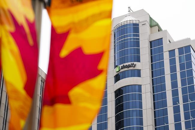 Shopify Inc.'s layoff this week will add a slew of new workers to the job hunting pool at a time when experts say candidates are taking longer to find their next gig. Shopify Inc. headquarters signage in Ottawa on Tuesday, May 3, 2022. THE CANADIAN PRESS/Sean Kilpatrick