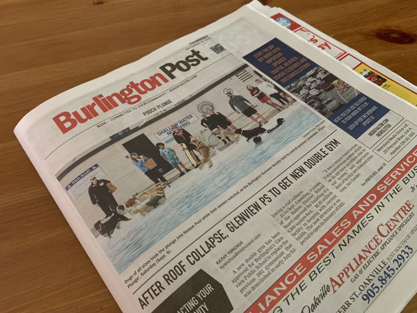 A copy of the Burlington Post is seen in Burlington, Ont., Friday, Sept. 15, 2023. THE CANADIAN PRESS/Sean Vokey