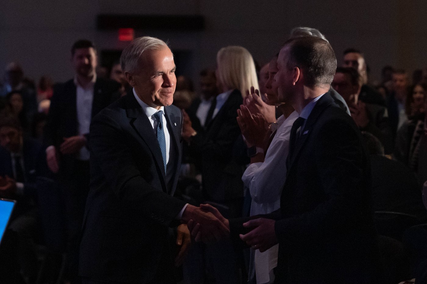 Prime Minister Mark Carney arrives to the Board of Trade breakfast in Vancouver, on Wednesday, May 20, 2026. THE CANADIAN PRESS/Ethan Cairns