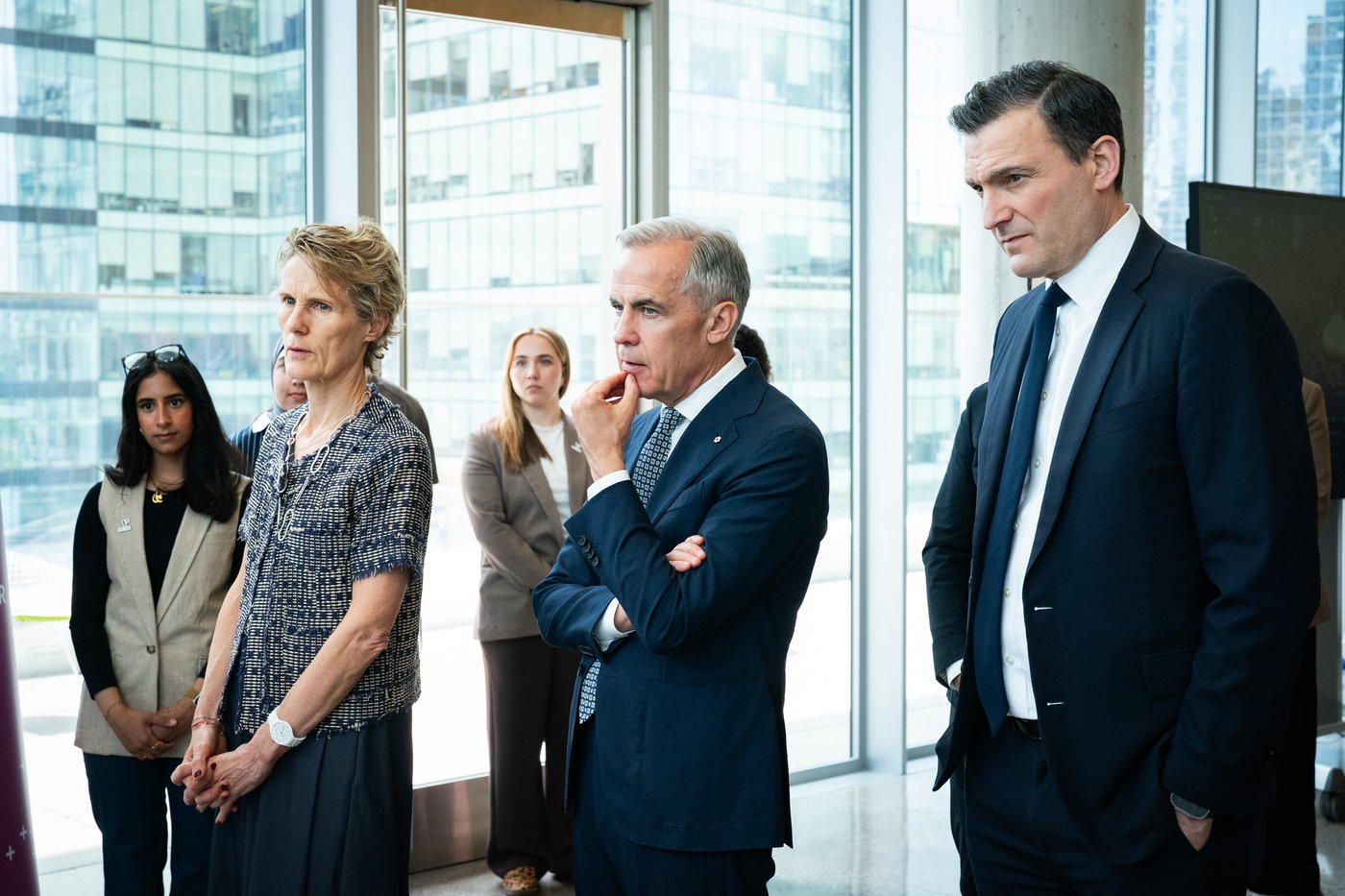 Diana Fox Carney, front left, Prime Minister Mark Carney, centre, and Artificial Intelligence Minister Evan Solomon visit technology startups at the Vector Institute, in Toronto on Thursday, June 4, 2026. THE CANADIAN PRESS/Arlyn McAdorey