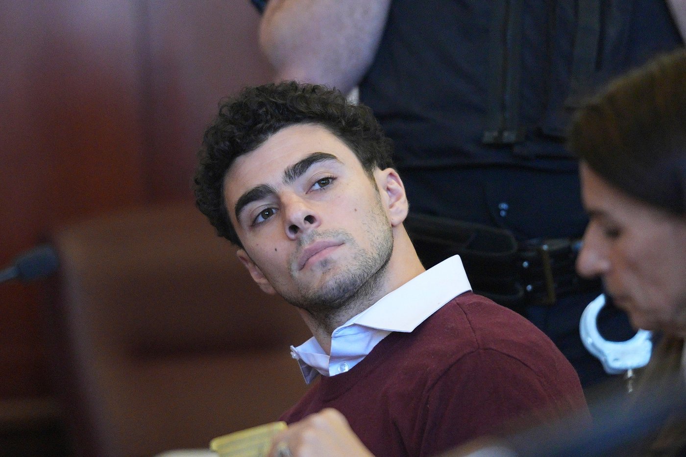 FILE - Luigi Mangione appears in Manhattan Criminal court, Dec. 23, 2024, in New York. (Curtis Means/Pool Photo via AP, file)