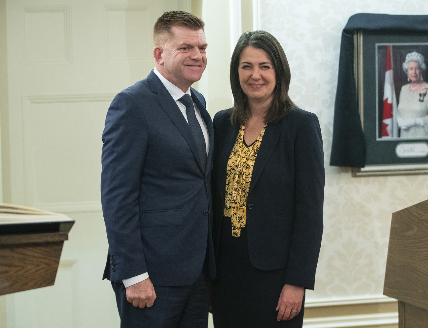 Brian Jean stands with Alberta Premier Danielle Smith after being sworn into cabinet as Jobs, Economy and Northern Development in Edmonton, Monday, Oct. 24, 2022. THE CANADIAN PRESS/Jason Franson