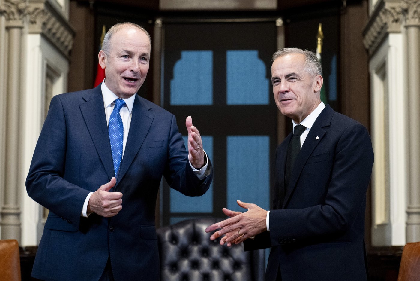 Prime Minister Mark Carney, right, greets Micheál Martin, the Taoiseach, or Prime Minister, of Ireland, in his West Block office on Parliament Hill in Ottawa, on Thursday, Sept. 25, 2025. THE CANADIAN PRESS/Spencer Colby