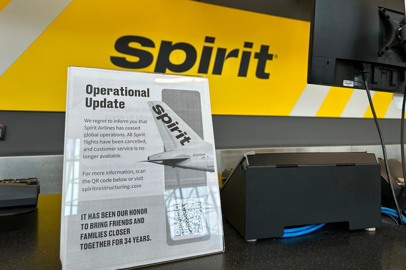 A sign announces Spirit Airlines’ shutdown on Saturday, May 2, 2026 at Hartsfield-Jackson Atlanta International Airport in Atlanta. (AP Photo/Jeff Amy)