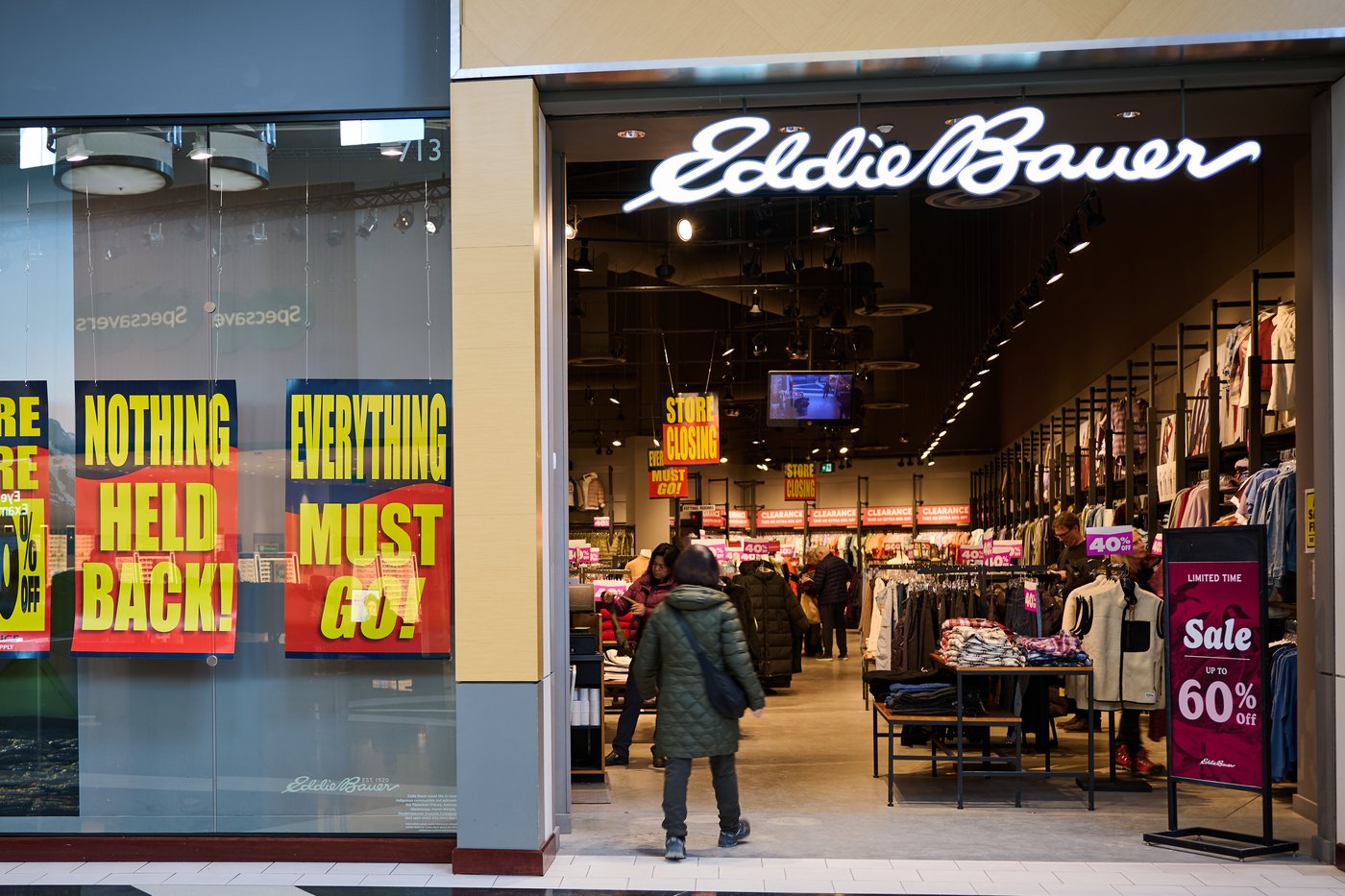 Shoppers pass a closing sale at an Eddie Bauer store in Vaughan, Ont., on Wednesday, Feb. 4, 2026. THE CANADIAN PRESS/Sammy Kogan