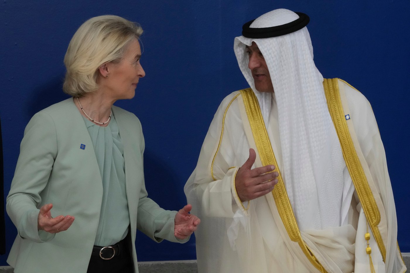 European Commission President Ursula von der Leyen, left, speaks with the Gulf Cooperation Council Secretary General Jasem Mohamed Albudaiwi before a family photo of the EU Summit in Nicosia, Cyprus, Friday, April 24, 2026. (AP Photo/Petros Karadjias)