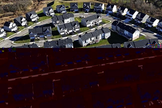 FILE - A housing development in Cranberry Township, Pa., is shown on March 29, 2024. The nation's housing market sales slump is dragging on into its third straight year, as evidenced by another weak spring home buying season. (AP Photo/Gene J. Puskar, File)