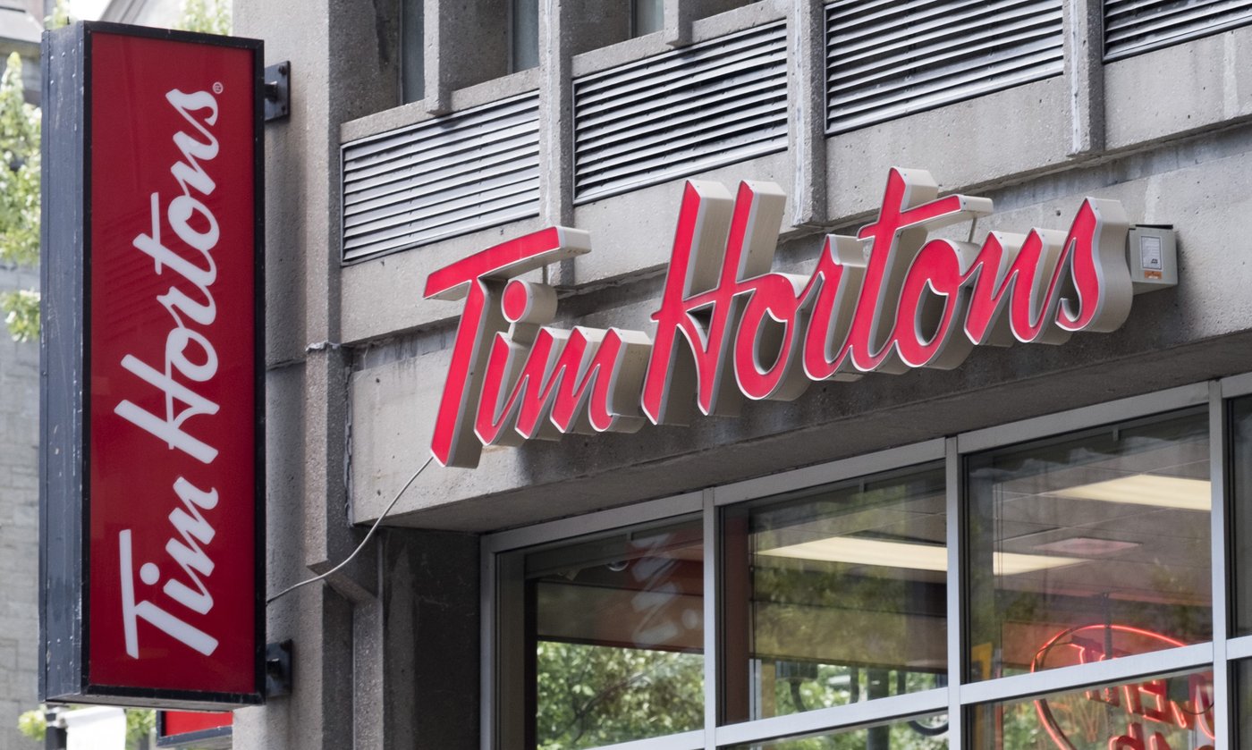 A Tim Hortons logo is pictured Tuesday, June 21, 2016 in Montreal. THE CANADIAN PRESS/Paul Chiasson