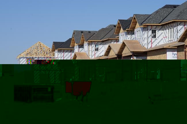 Canada Mortgage and Housing Corp. says the annual pace of housing starts in April edged down one per cent compared with March. A new housing development is shown in Belleville, Ont., on Friday, March 1, 2024. THE CANADIAN PRESS/Chris Young