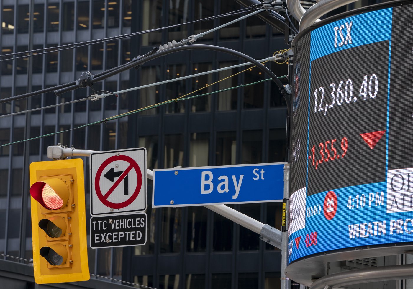 A sign board in Toronto displays the TSX close on Monday March 16, 2020. THE CANADIAN PRESS/Frank Gunn