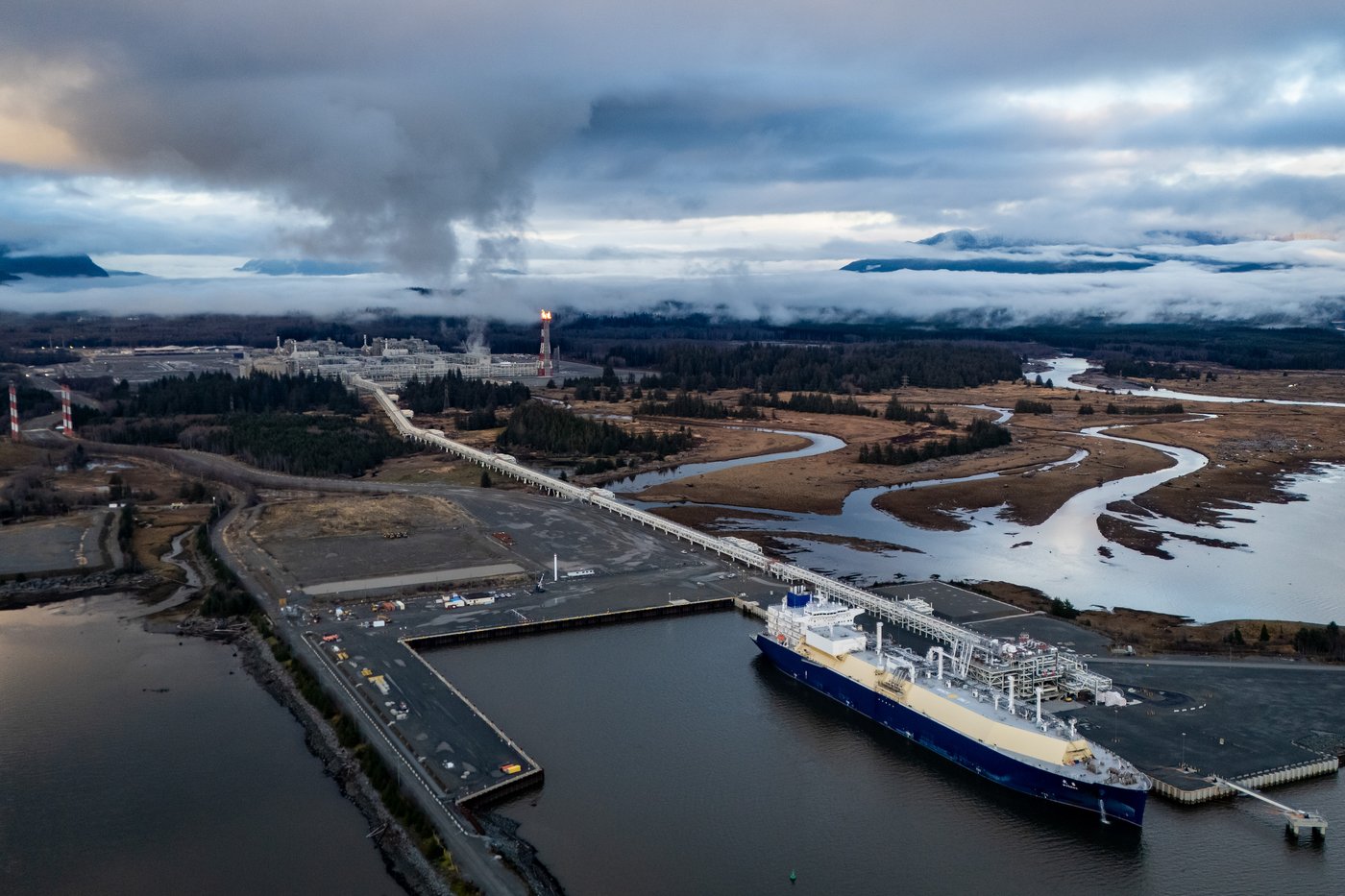Wudang, a liquefied natural gas (LNG) tanker, fills up at an LNG Canada facility, in an aerial view, in Kitimat, B.C., on Thursday, Nov. 13, 2025. THE CANADIAN PRESS/Ethan Cairns