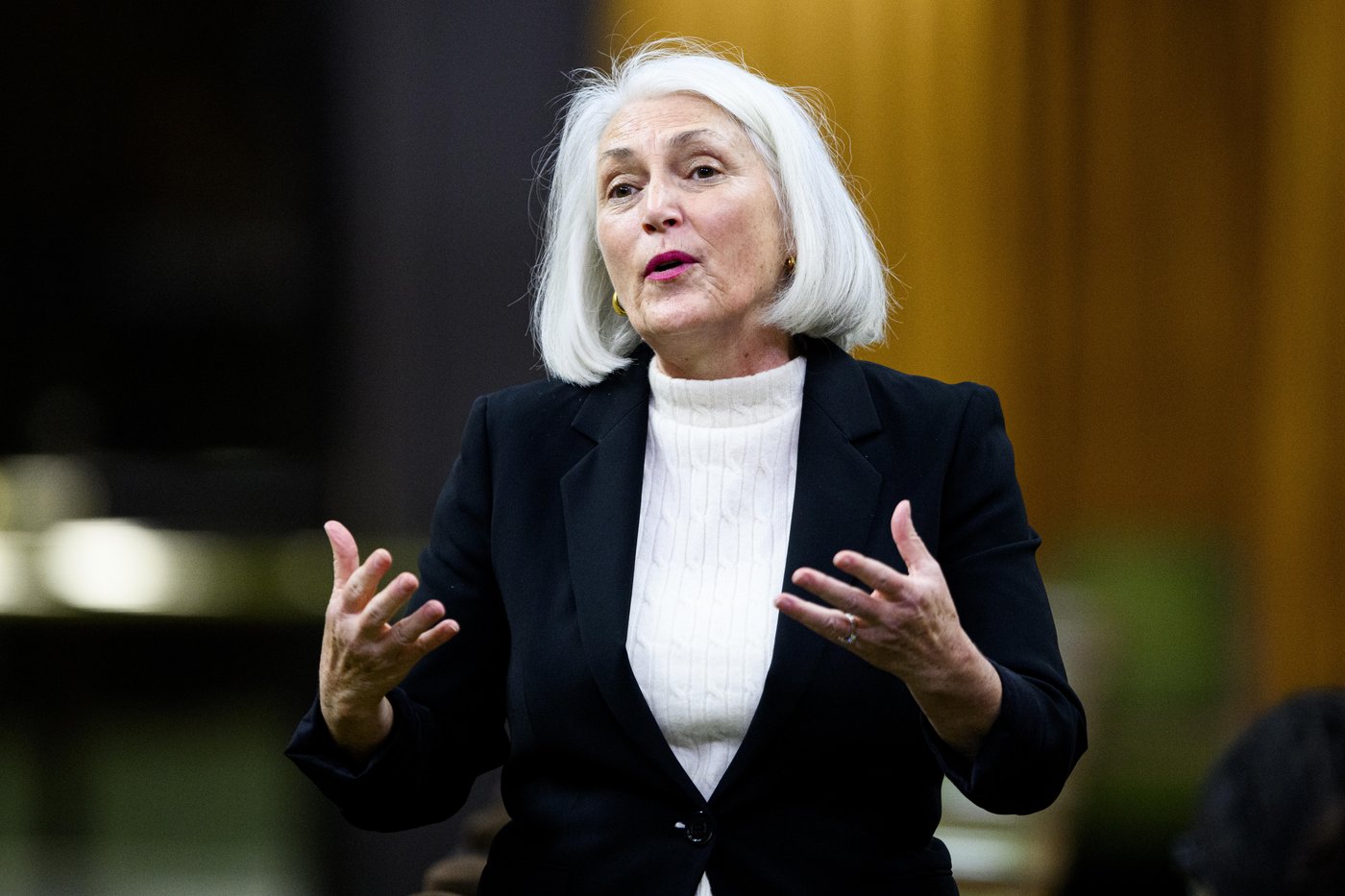 Minister of Fisheries Joanne Thompson rises during Question Period in the House of Commons on Parliament Hill in Ottawa on Friday, Dec. 5, 2025. THE CANADIAN PRESS/Spencer Colby