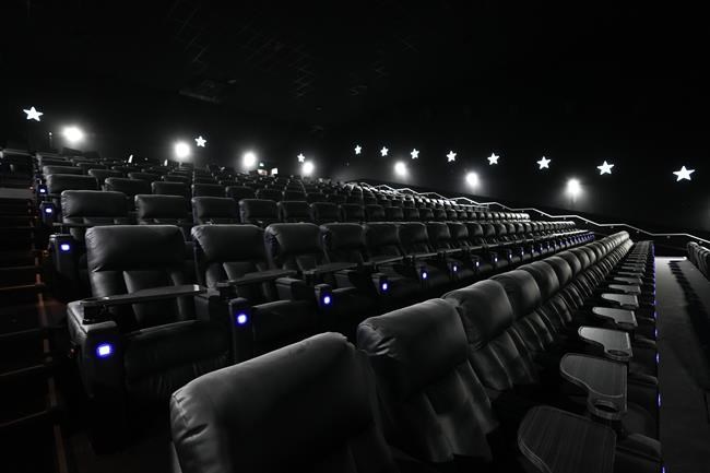 Cineplex Inc. reported a profit in its latest quarter compared with a loss a year ago as its results were boosted by the sale of its arcade game business. Theatre seats are shown at Cineplex Junxion Erin Mills in Mississauga, Ont., on Monday, April 24, 2023. THE CANADIAN PRESS/Nathan Denette