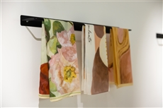 A rack with towels on itDescription automatically generated