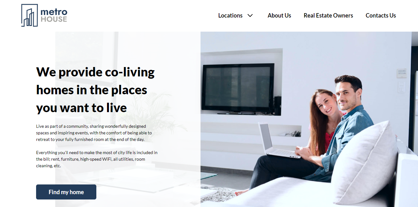 Two people sitting on a couchDescription automatically generated with medium confidence