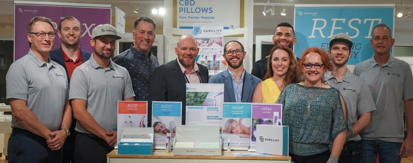 A group of people posing for a photoDescription automatically generated