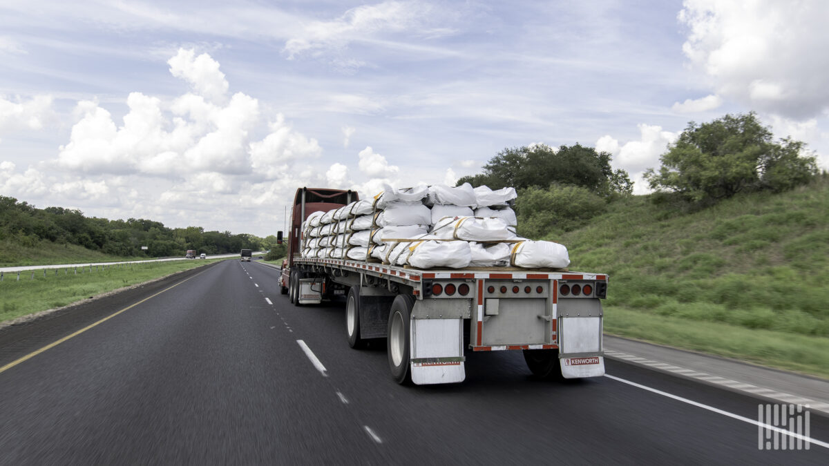 A flatbed rig on the highway