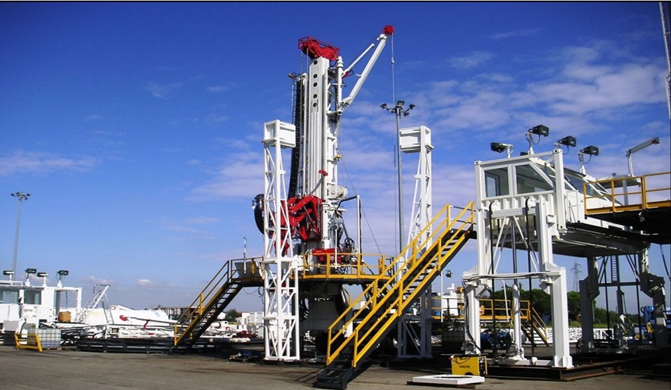 200 Ton Self Walking Drill rig built by Drillmec Inc. It is designed to walk upright from well to well and is similar in design to the rigs planned for this project.