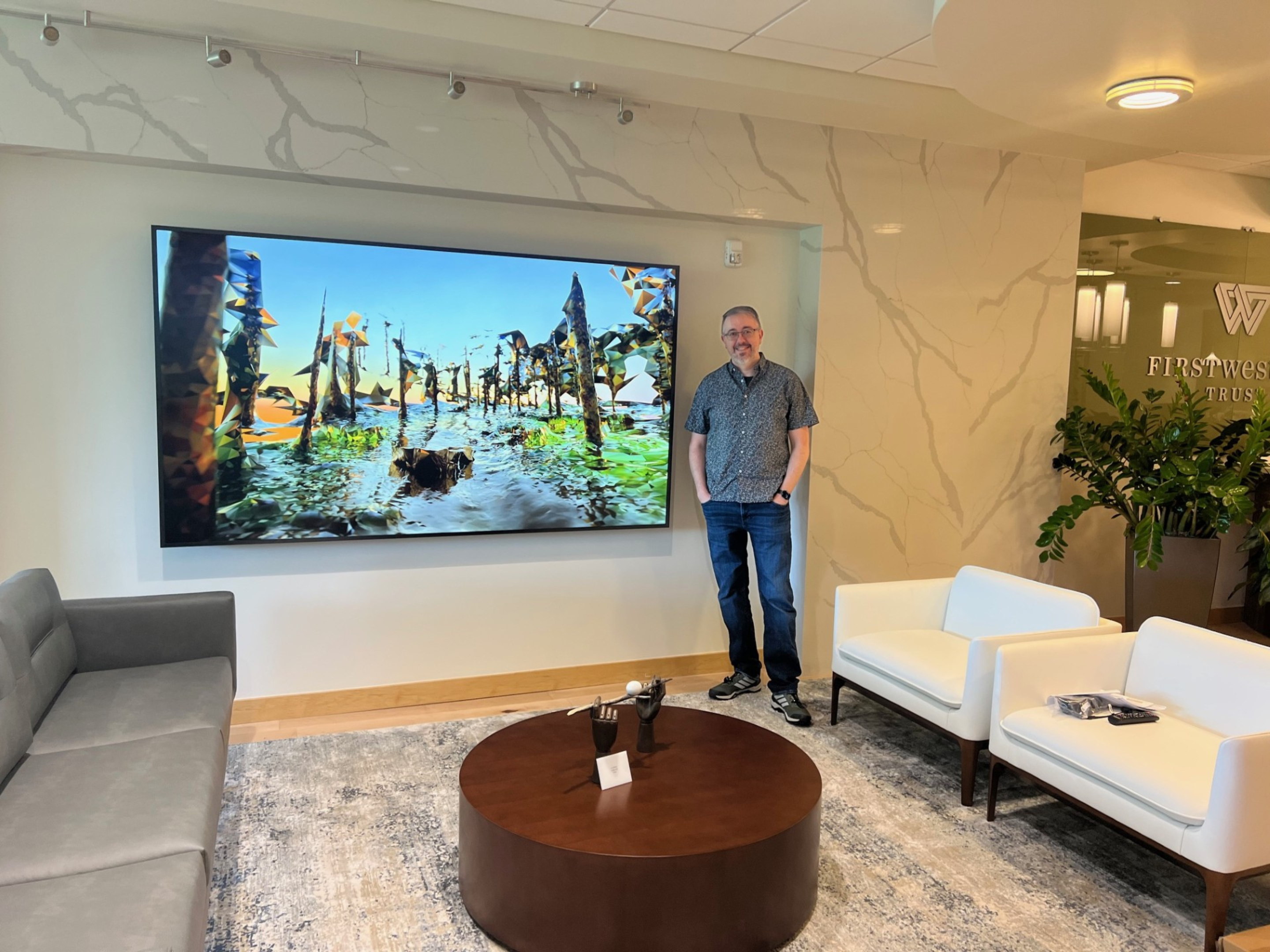 Artist Chris Coleman with Adularia in the First Western Trust Boulder Office