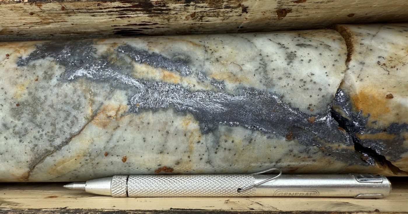 Hole SR25-003 at 18m showing galena vein cutting quartzite with disseminated pyrite-arsenopyrite.