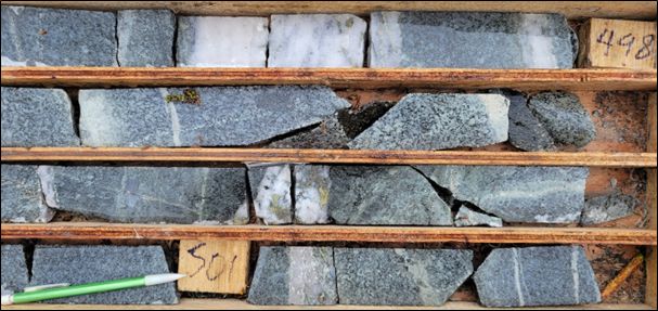 Porphyry-style quartz-sulphide and sulphide veining, associated with weak phyllic alteration overprinting propylitic alteration within the granodiorite intrusion. Photo is from LIB24-004 between 497.5 m and 501.3 m.