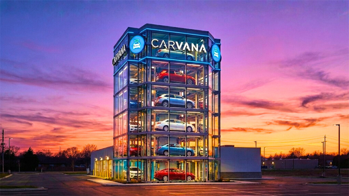 Carvana car vending machine tower at sunset, highlighting online used-car sales growth and CVNA stock.