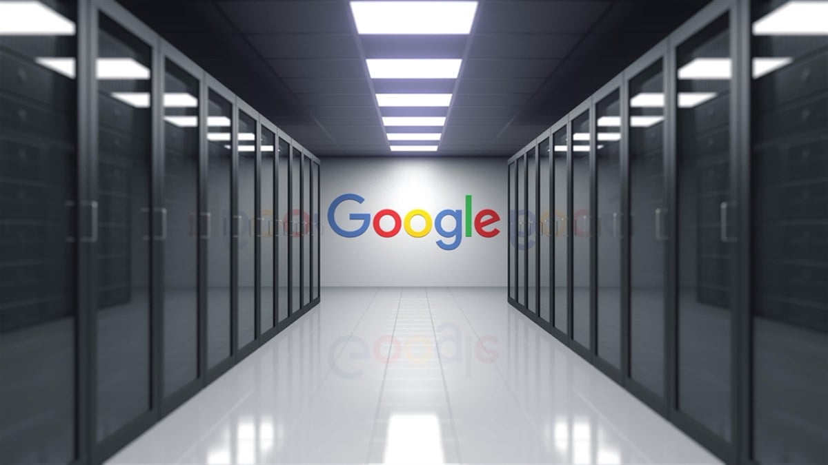 Google logo on the wall within a server room. 