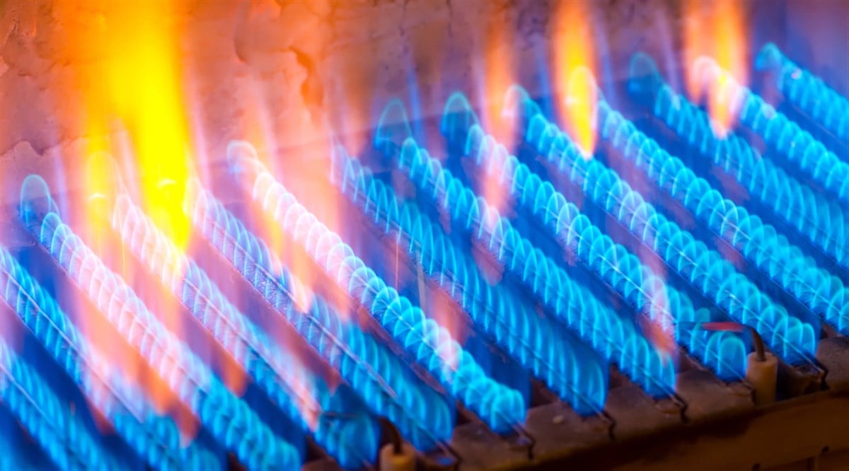 The fire burns from a gas burner. Blue flame when burning gas. — Photo