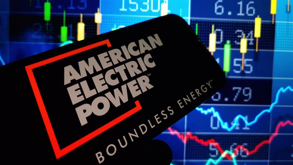 American Electrc Power logo on smartphone with stock chart in background
